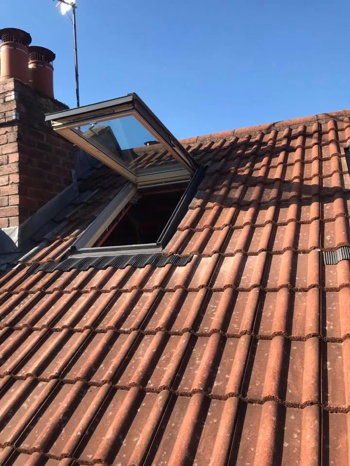 a roof with a skylight on top of it